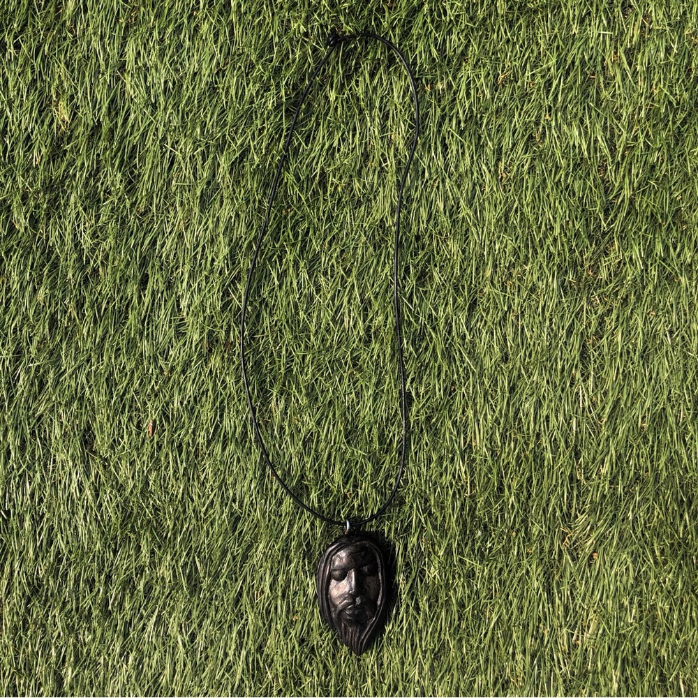 Wooden head necklace